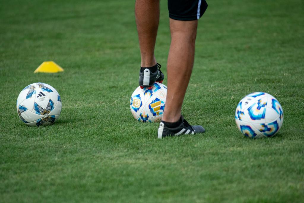 soccer training session on green field